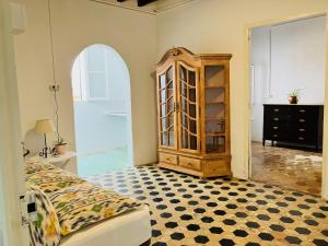 Posteľ alebo postele v izbe v ubytovaní Hostal Pons