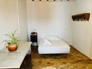 Posteľ alebo postele v izbe v ubytovaní Hostal Pons