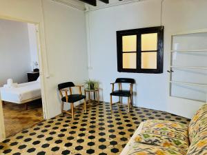 Posteľ alebo postele v izbe v ubytovaní Hostal Pons
