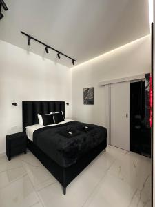 Posteľ alebo postele v izbe v ubytovaní V21 Luxury Apartments