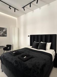 Posteľ alebo postele v izbe v ubytovaní V21 Luxury Apartments