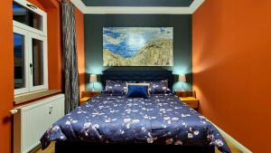 Postel nebo postele na pokoji v ubytování ArtHouse Lilienstein