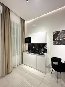 Kuchyňa alebo kuchynka v ubytovaní V21 Luxury Apartments