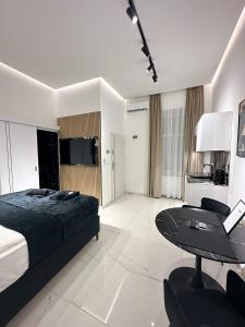 Posteľ alebo postele v izbe v ubytovaní V21 Luxury Apartments
