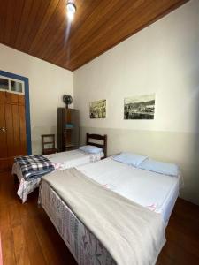 Voodi või voodid majutusasutuse Hostel Central toas