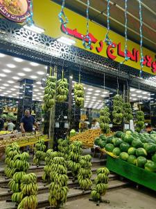 a store filled with lots of bananas and other fruits at غرفة سنجل بحمام خاص لمزيد من الخصوصية Single Room with private bathroom for more privacy Номер с отдельной ванной комнатой для большей конфиденциальности Chambre avec salle de bain privée pour plus d'intimité in Cairo