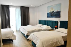 Postel nebo postele na pokoji v ubytování Elite Hotel + 37 fotografií