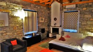 Postel nebo postele na pokoji v ubytování Pelion Goddess Villas