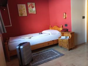 Postel nebo postele na pokoji v ubytování Hotel Adele