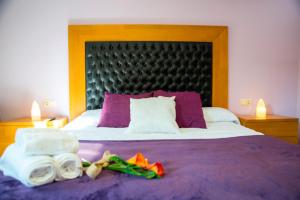 A bed or beds in a room at CASA BELAI