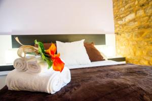 A bed or beds in a room at CASA BELAI