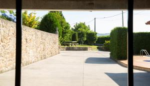 A garden outside CASA BELAI