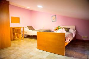 A bed or beds in a room at CASA BELAI