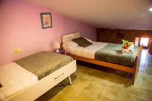 A bed or beds in a room at CASA BELAI