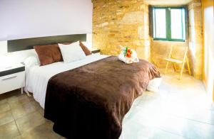 A bed or beds in a room at CASA BELAI