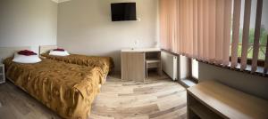 Posteľ alebo postele v izbe v ubytovaní Hotel Intourist