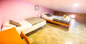 A bed or beds in a room at CASA BELAI