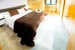 A bed or beds in a room at CASA BELAI