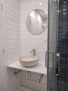 a bathroom with a sink and a mirror at NEBOKRAJ in Kraj +61 photos