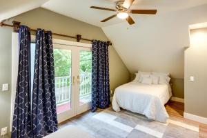 a bedroom with a bed and a window at Sheboygan Getaway with Deck and On-Site Lake Access! in Sheboygan