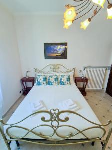 Letto o letti in una camera di Varigotti Tropical Garden - full floor apartment