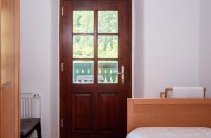 Ένα ή περισσότερα κρεβάτια σε δωμάτιο στο Riverview Lodge