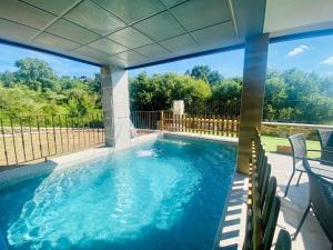 The swimming pool at or close to Raices