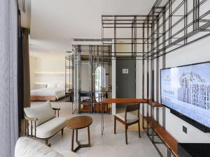 Televisyen dan/atau pusat hiburan di Orient Luxury Hotel-Jiaoxi
