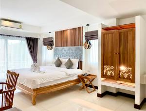 Кровать или кровати в номере My Chiangmai Boutique Lodge +85 фотографий