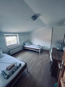 Postel nebo postele na pokoji v ubytování Rooms Busija