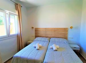 Posteľ alebo postele v izbe v ubytovaní Villas Florida