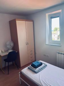 Postel nebo postele na pokoji v ubytování Rooms Busija