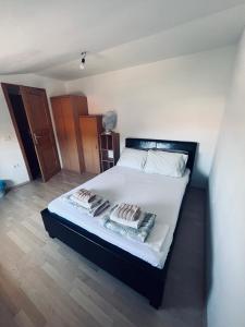 Postel nebo postele na pokoji v ubytování Rooms Busija