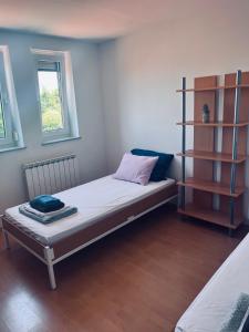 Postel nebo postele na pokoji v ubytování Rooms Busija
