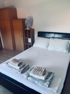 Postel nebo postele na pokoji v ubytování Rooms Busija