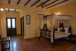 Tree of Life Resort Dehradun Foothills客房内的一张或多张床位