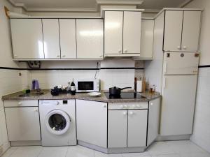 Kuchyň nebo kuchyňský kout v ubytování Apartamento Plaza de la Paz
