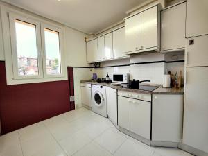 Kuchyň nebo kuchyňský kout v ubytování Apartamento Plaza de la Paz