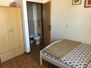 Postel nebo postele na pokoji v ubytování Dom Jana