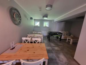 Posedenie v ubytovaní Apartamenty Willove Wzgórze