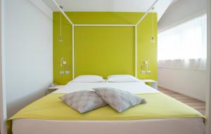 Postel nebo postele na pokoji v ubytování Hotel Stadio & Spa