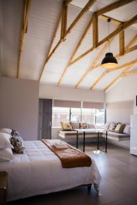 Ένα ή περισσότερα κρεβάτια σε δωμάτιο στο Frankfort Self Catering