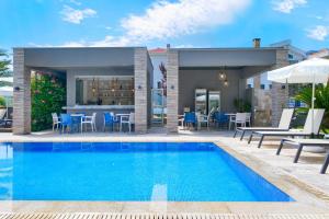 an image of a swimming pool in a villa at Vereya Beach in Chrysi Ammoudia