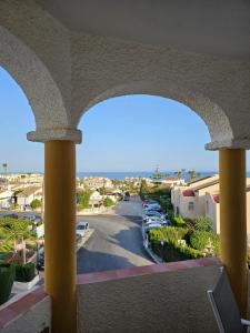 a view from a balcony of a parking lot at Apartamento SEA VIEW Celeste Costa del sol Playa Chapparal in Mijas Costa