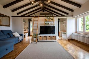 Et tv og/eller underholdning på Amazing views over San Sebastian in a family cottage