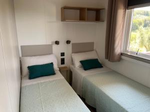 Postel nebo postele na pokoji v ubytování Glamping Tuscany - Podere Cortesi