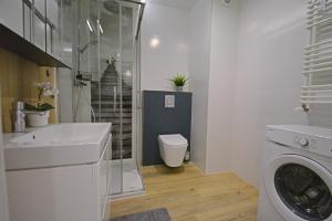 Kúpeľňa v ubytovaní Apartamenty Bryza-Matejki 1B-Parking