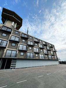 a large building with a lot of windows at The Atlantis - Tower Apartments in Great Yarmouth