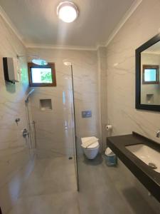 Koupelna v ubytování Kilim Hotel & Apart