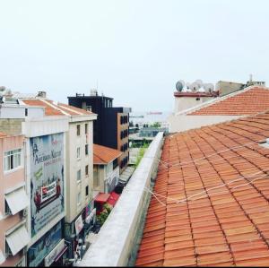 an overhead view of buildings with red roofs at Bakırköy Macro Suite Otel in Istanbul
